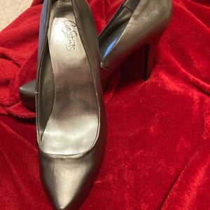 Pewter high heel shoes made by Citi Strat’s
